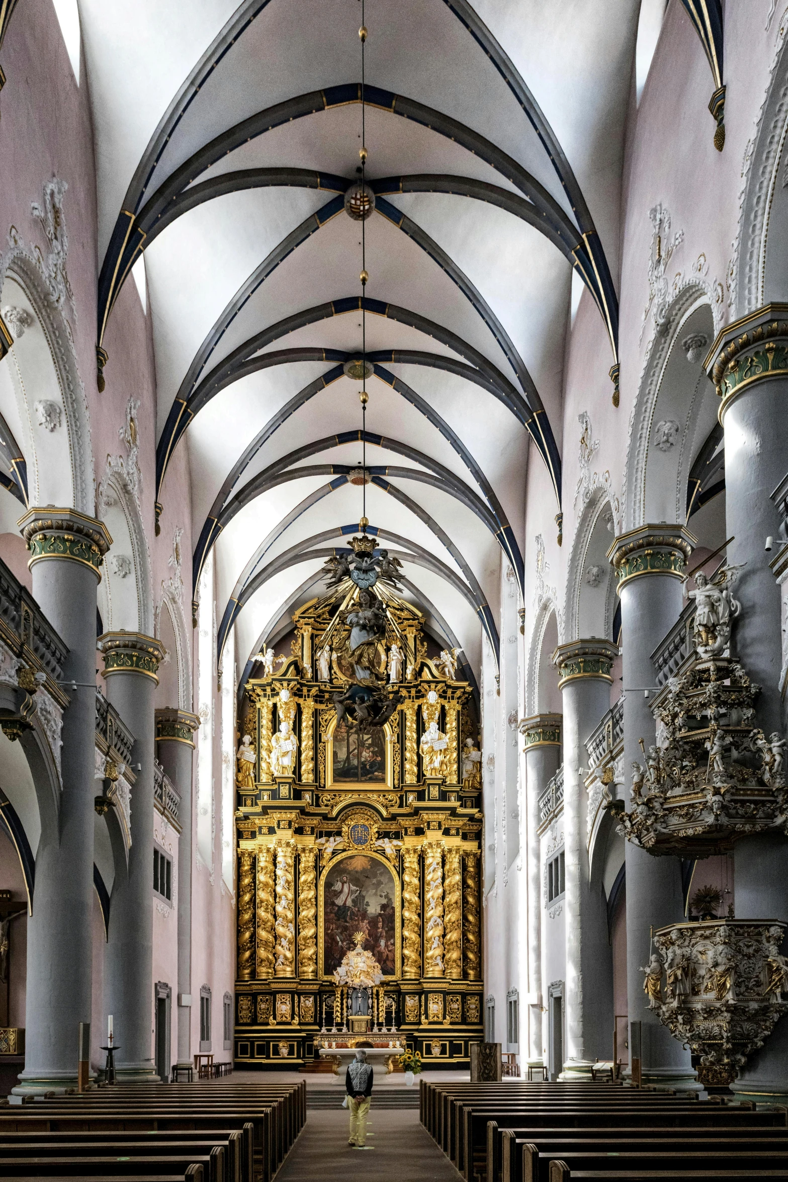 the inside of a church looking towards the alter