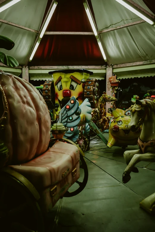 a group of benches inside of a store covered in decorations