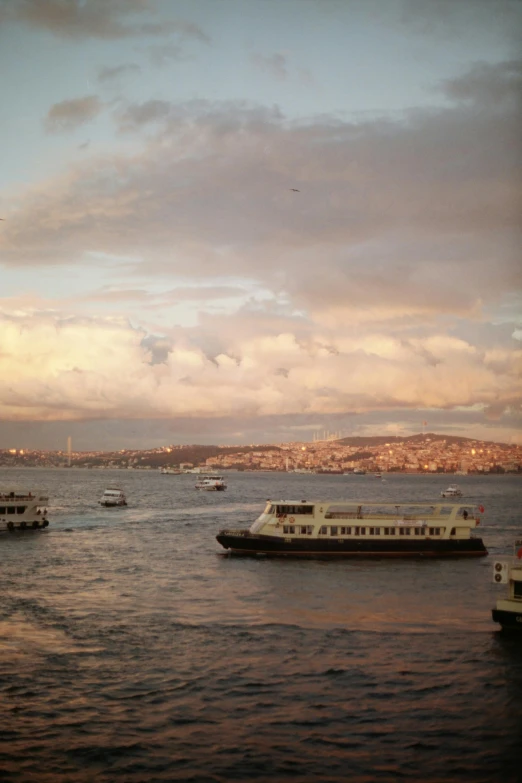 two large ferry boats in the middle of the ocean