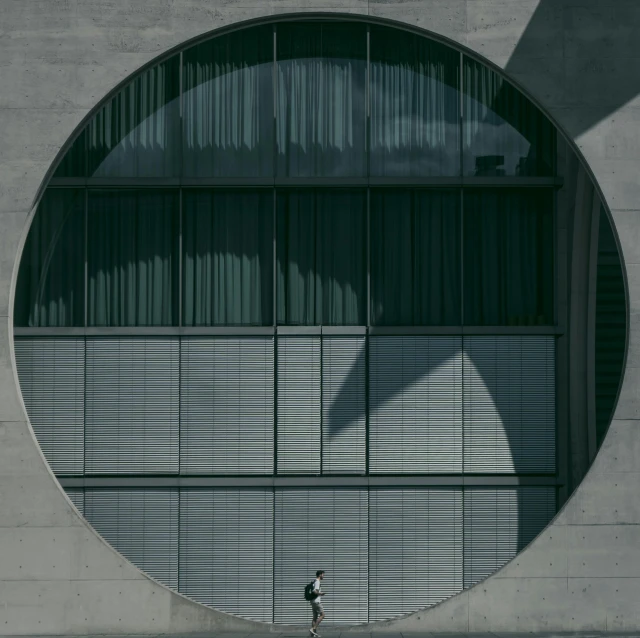 the shadows are cast on the wall of a building