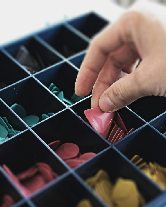 a close up of a persons hand reaching for soing