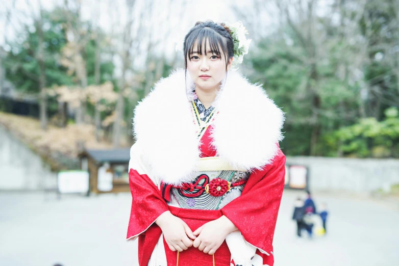 a woman dressed in japanese style clothing