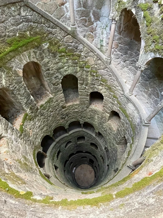 a staircase with round stairs going up and down