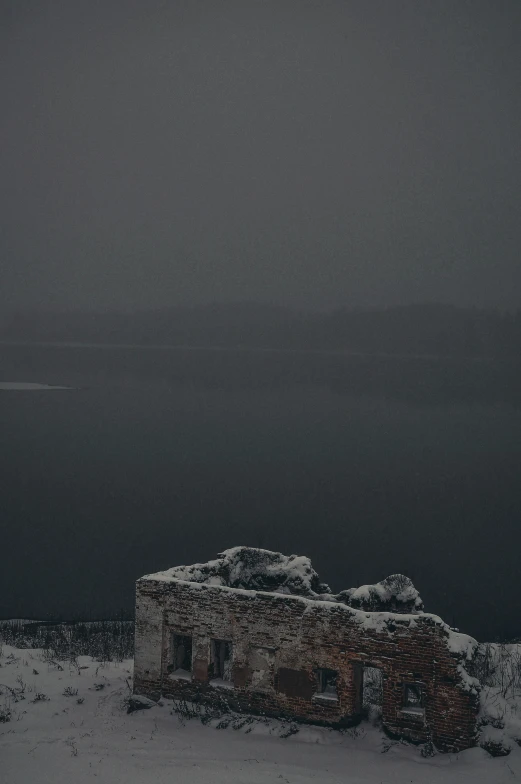 a building sits in the snow covered ground