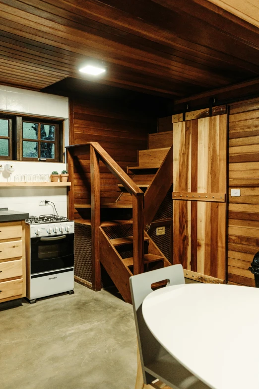 kitchen with sink, stove, and open wooden door