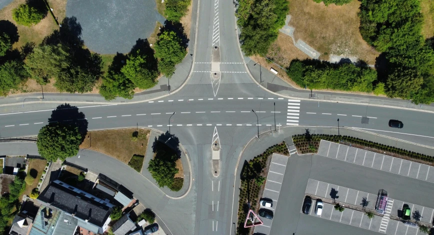 an aerial view of a roundabout and a street