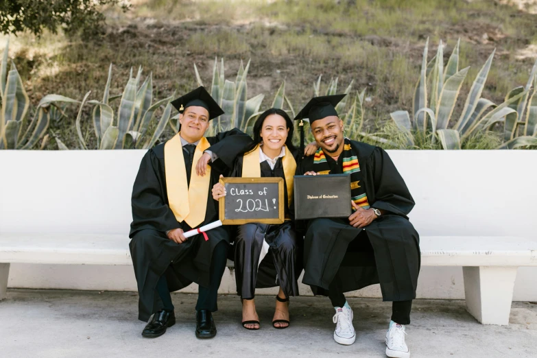 an image of graduation couple posing for po