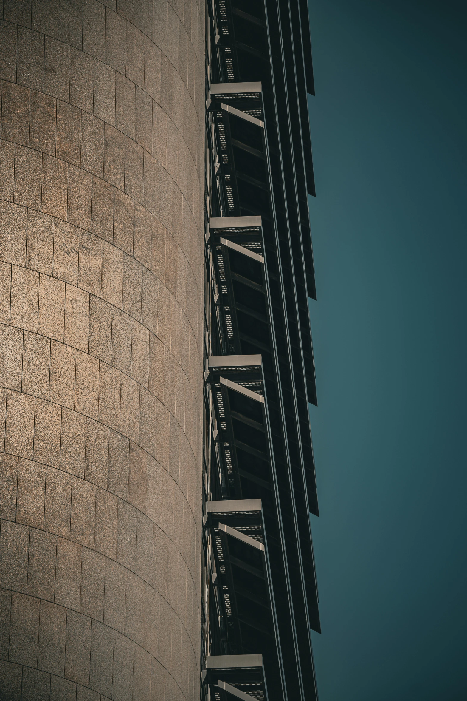 the sign is pointing upward to the blue sky