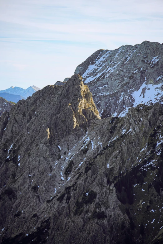 a mountain peak is shown with the snow on it