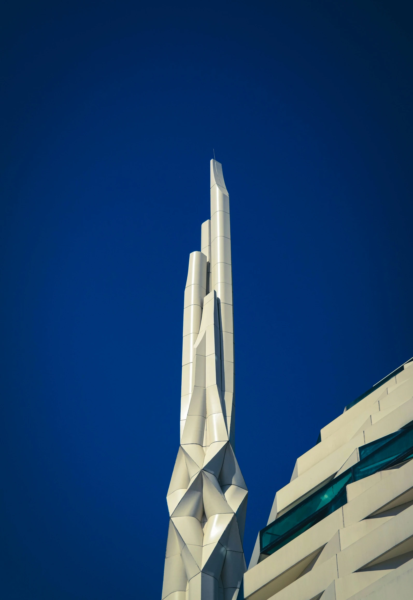 a white building with a massive bird's head