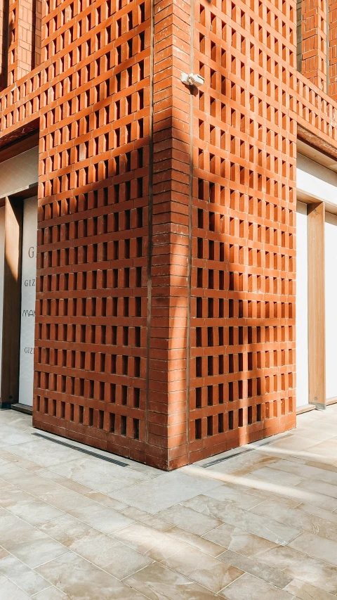 a brick building is made to look like it has holes on the side