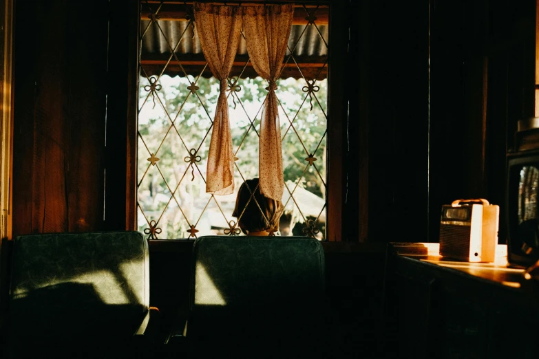 the view of a person is looking out of a window