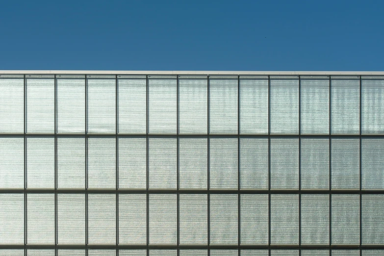 a large building that has a skylight in front of it