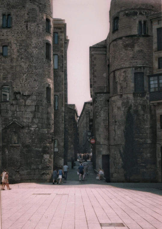 a group of people that are walking down a street