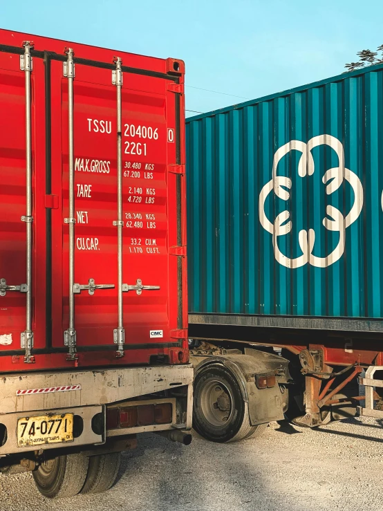 an image of two containers on the back of a truck