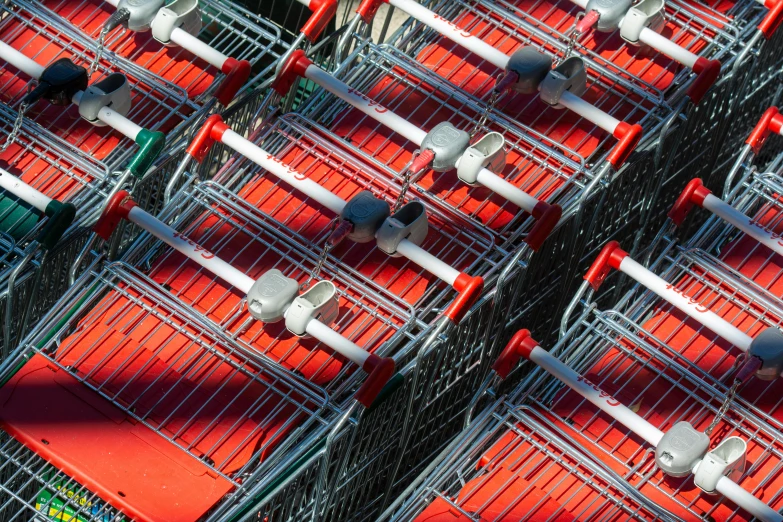 many carts that have red and white seats