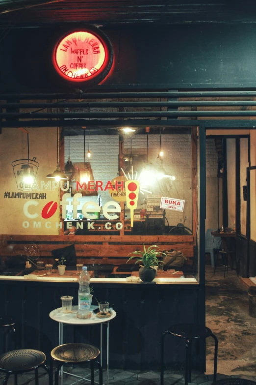 a sign above the counter outside of a restaurant