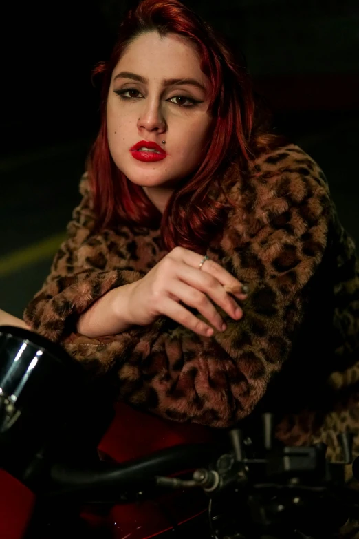 a beautiful woman with red hair and red lips