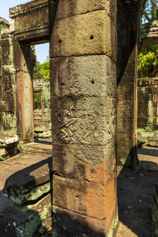 the columns in the ruins have carvings on them