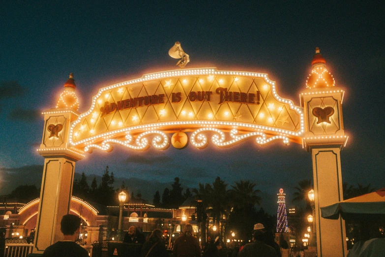 an illuminated park entrance on a christmas night