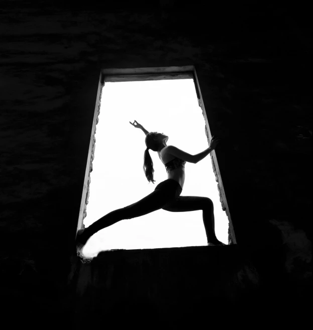 the black and white po shows a woman reaching up into a window