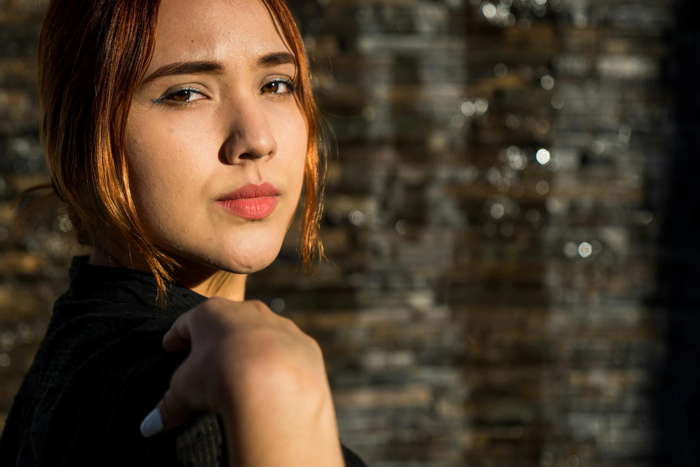 a close up portrait of a woman with red hair