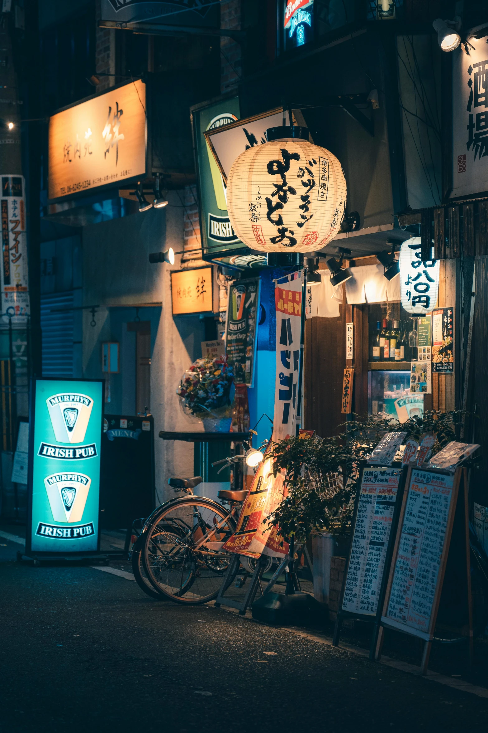 a storefront with several lights at night time