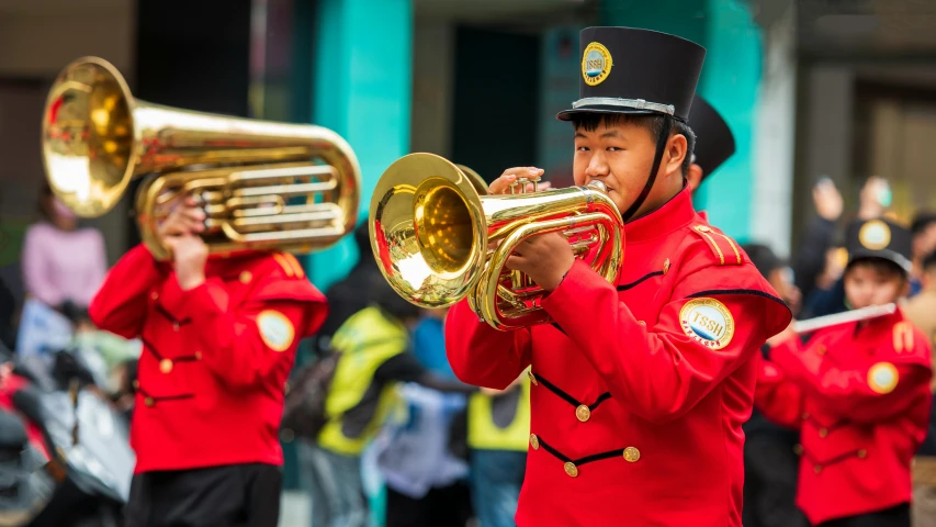 the marching team is playing at a parade