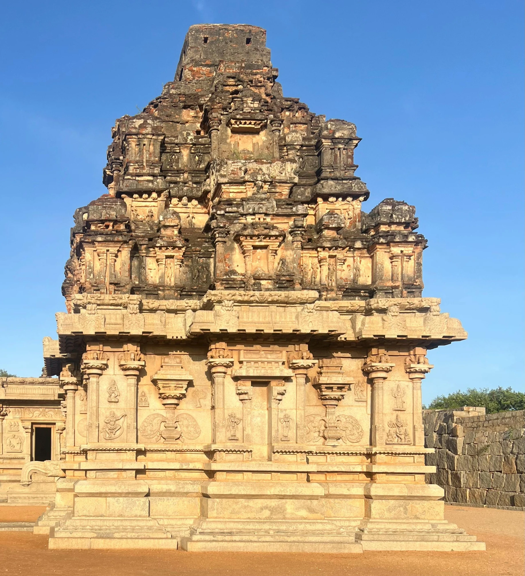 some very pretty tall stone structures against a blue sky