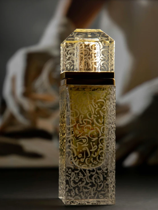 a close up of an elegant perfume bottle