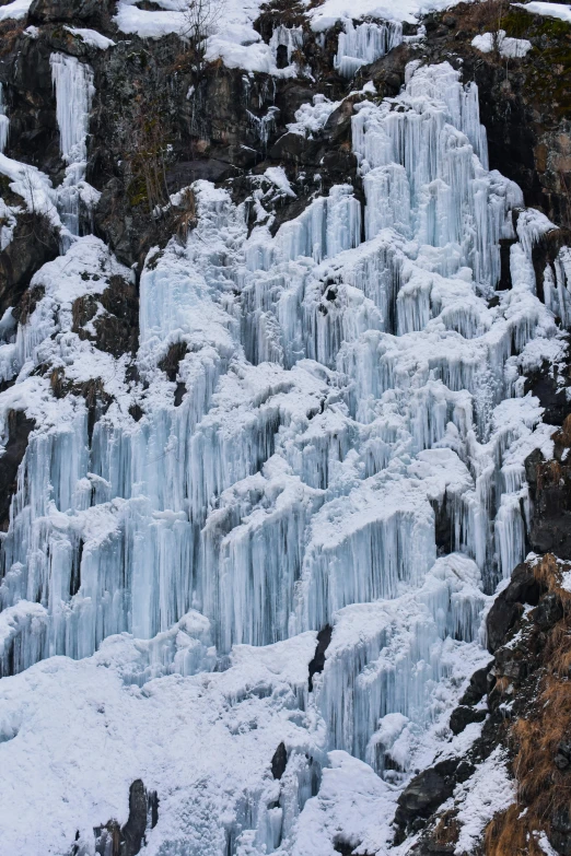 this po shows a snow covered cascade of frozen water