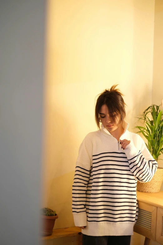 woman with messy hair combing her hair