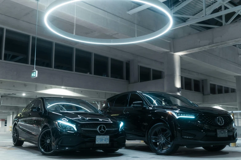 a pair of cars parked in a parking lot