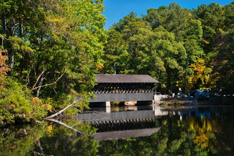 the boat is at the dock on the lake