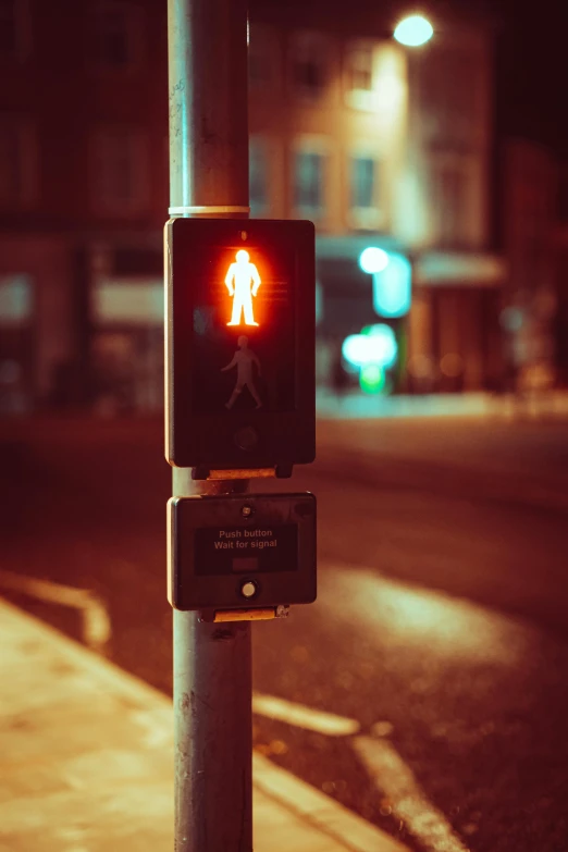 a traffic signal showing a man's walk across