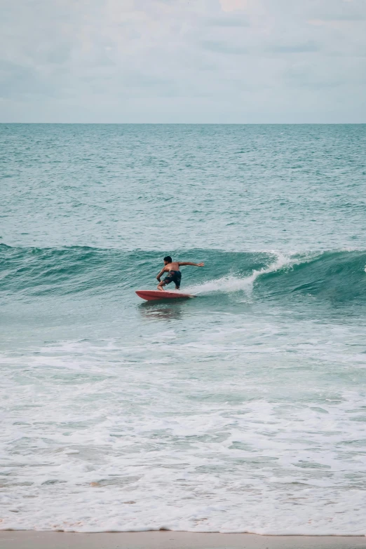 a surfer riding the crest of a wave in the ocean