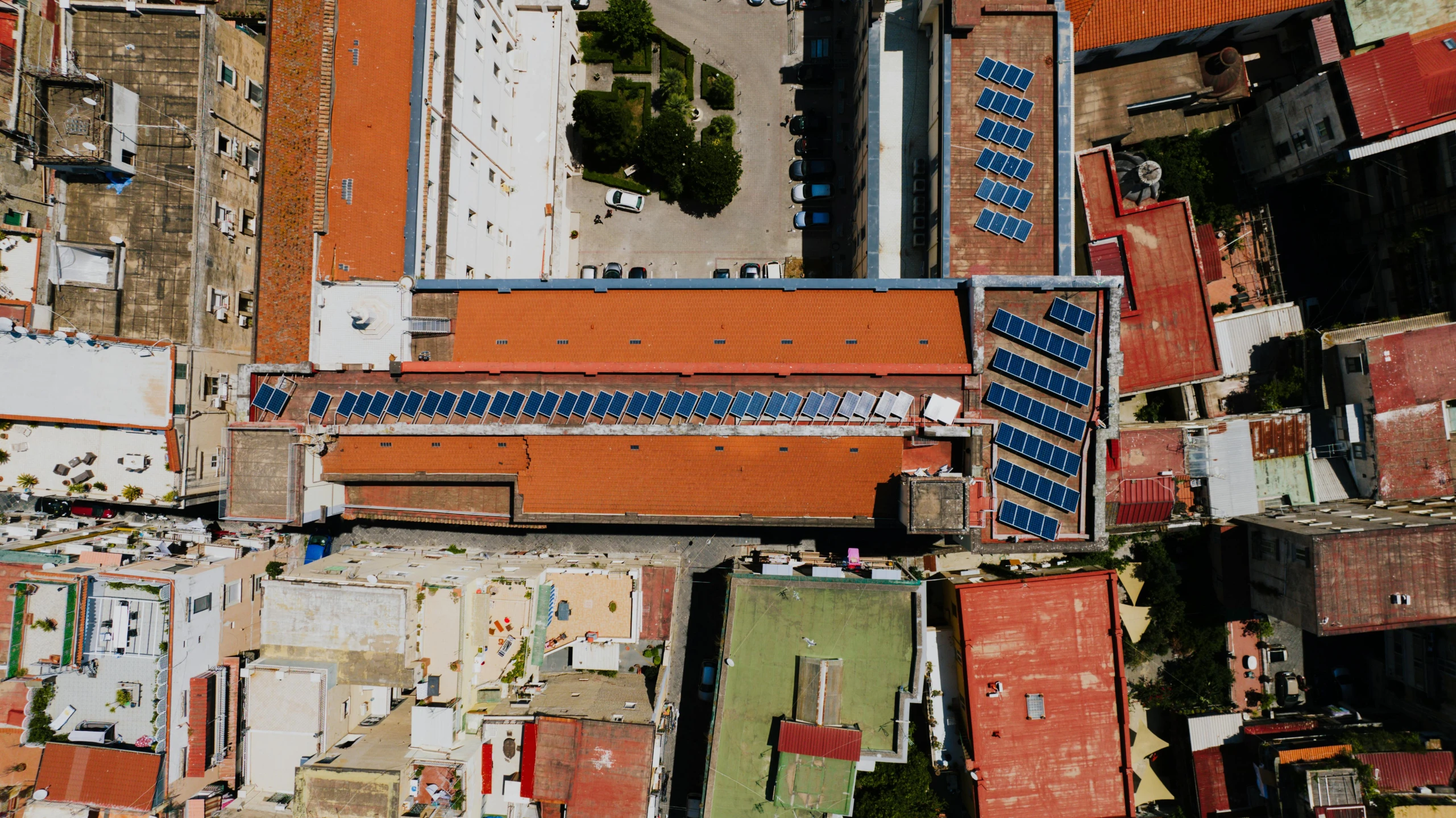 an aerial s of rooftops and buildings in the city