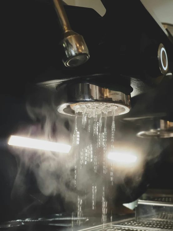 a close up of water coming from a steam boiler