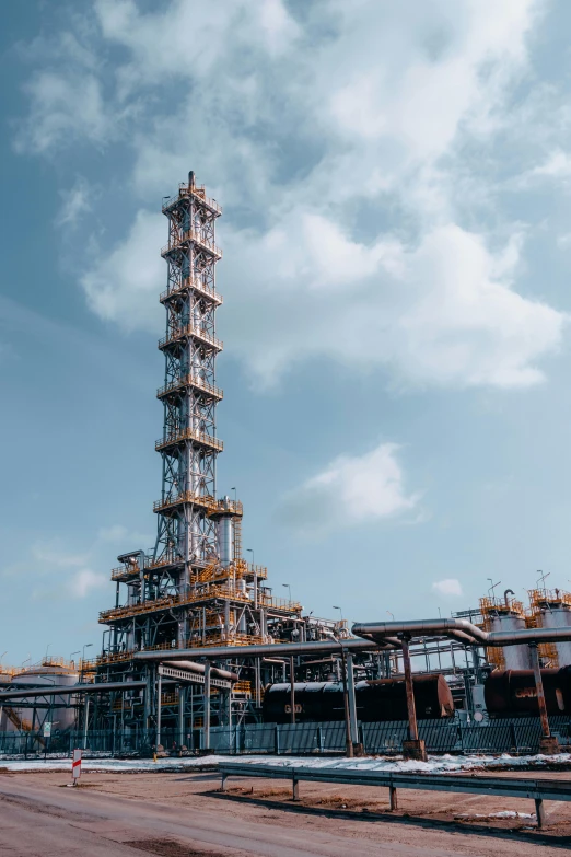 large building with pipe lined with metal structure on top