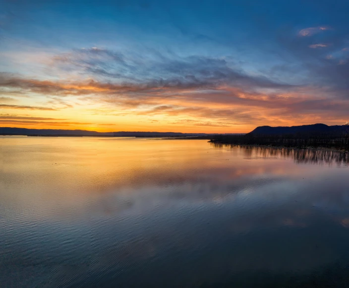 a body of water that has some water and land