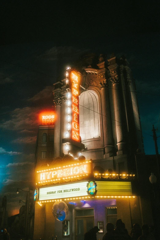 a theater building with marquees on it's side