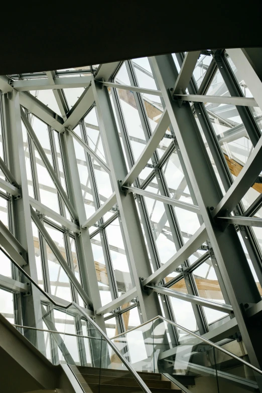 a high rise glass ceiling with a skylight