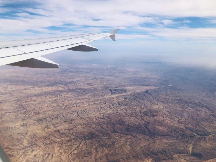 view from an airplane of a desert landscape