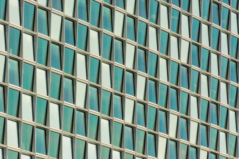 a glass wall with a clock on it