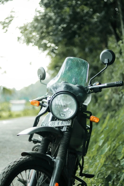 a motorcycle parked on the side of a road