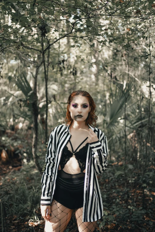 a woman with makeup on her face standing outside