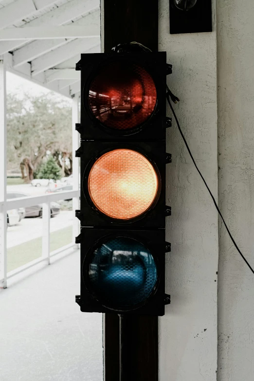 the light is on, and the pedestrian signal is red