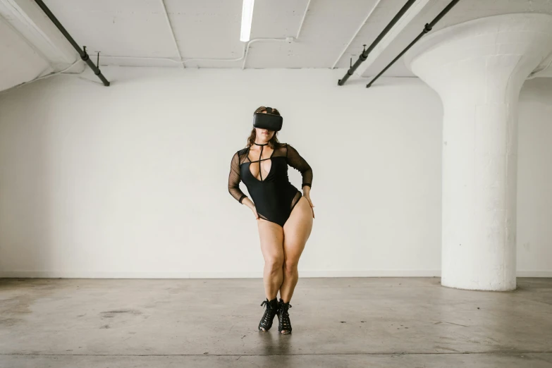 woman in costume posing on the ground with her hat on