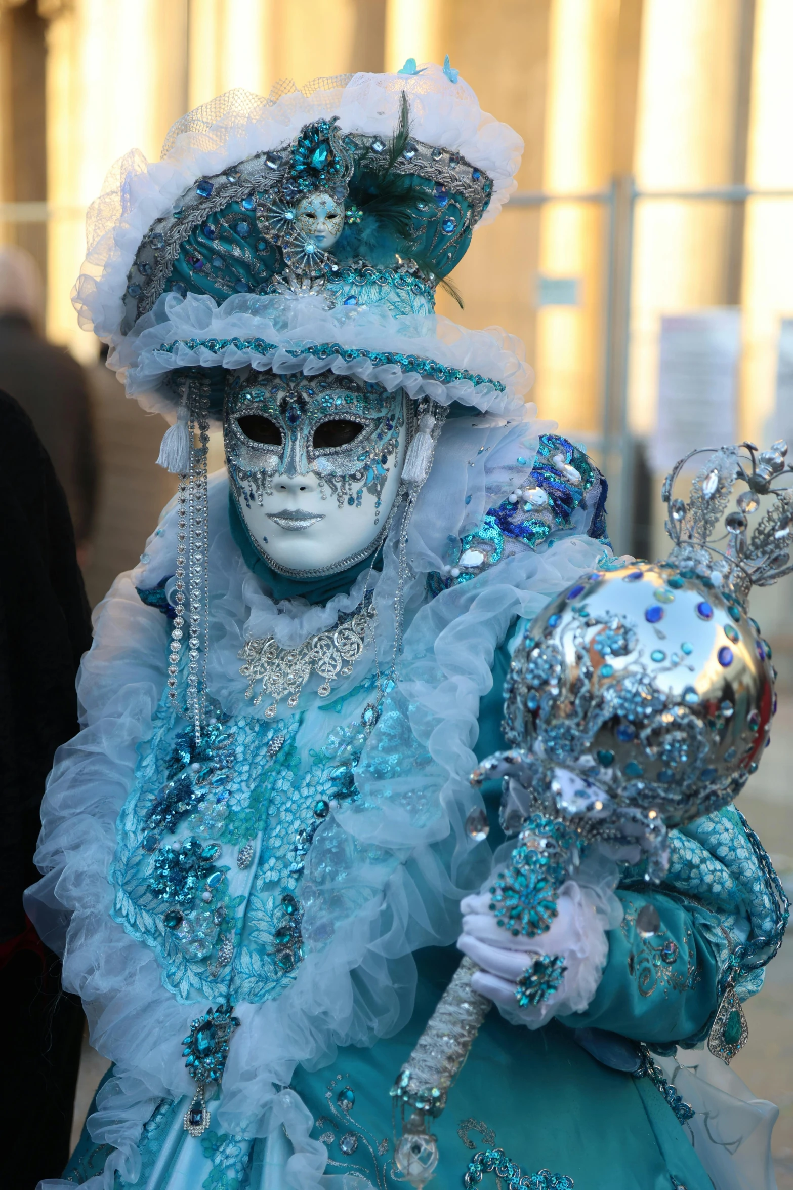 a close up of a mask with a large white face