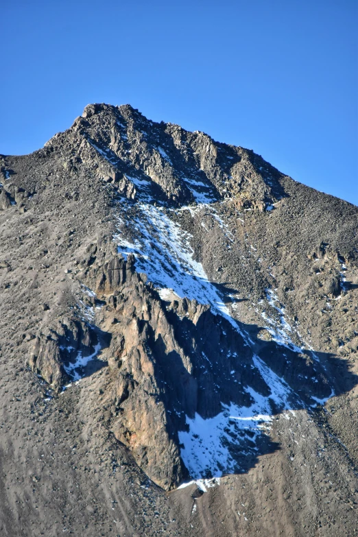 a mountain that is very high up in the sky